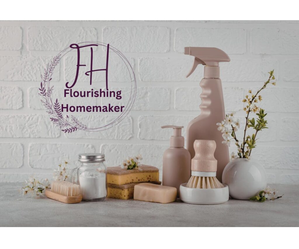 cleaning supplies placed neatly on a stone countertop with a Flourishing Homemaker logo.
